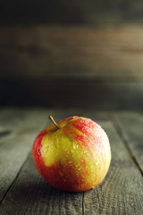 Apple on wooden background