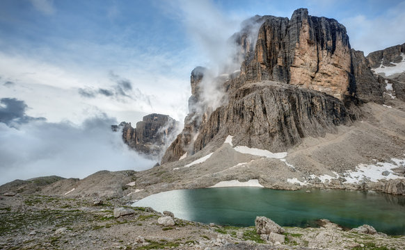 Fototapeta Clouds Break over the Dolomite Mountains