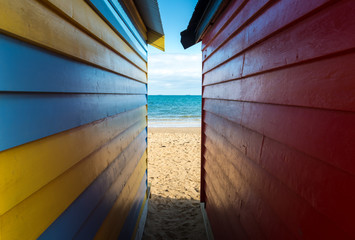 The sea look through from the side of bathing boxes on Dendy Street Beach, Brighton beach of Melbourne.