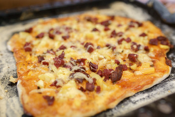 home pizza on a baking sheet