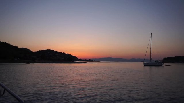 Sunset Sailing in a small bay in Greece