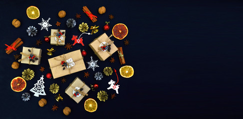 Season of greetings. Celebratory background with gifts, spices and natural decor.