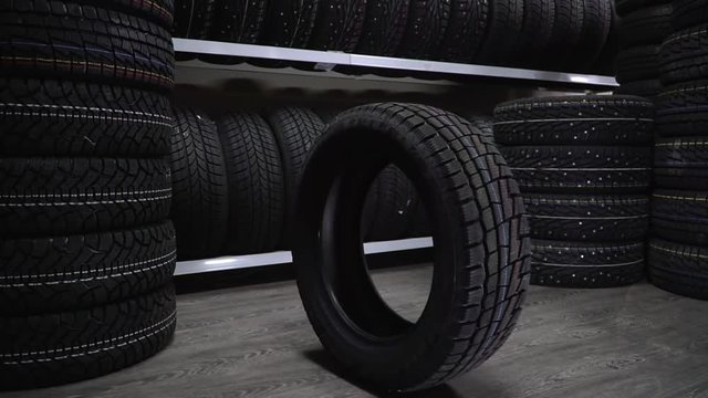 The tire fell off the shelf to the floor