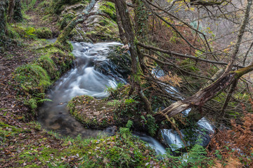 Spectacular waterfalls hidden in Spanish forests in autumn days