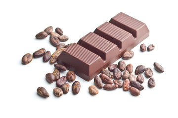 Dark chocolate bar and cocoa beans.