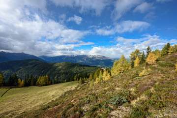 Fototapeta na wymiar Autumn alpine landscape as seen from the Goldeck panoramic road. The Alps, Carinthia, Austria.