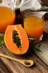 papaya juice on wooden table