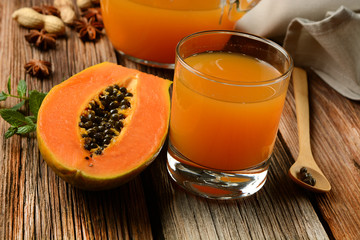 papaya juice on wooden table