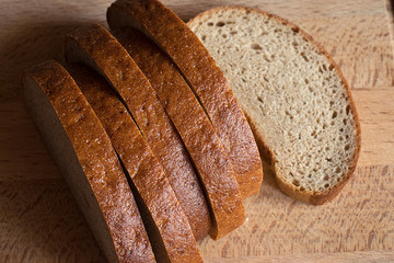 pieces of bread on a wooden surface