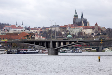 Fototapeta premium View on the autumn Prague gothic Castle above River Vltava, Czech Republic