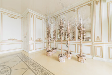 Christmas morning. luxury classic apartments with a white fireplace. © malkovkosta