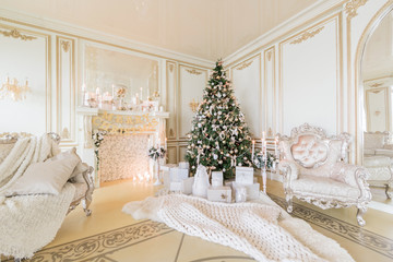 Christmas morning. luxury classic apartments with a white fireplace.