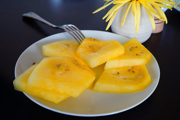 Platter of sliced yellow watermelon