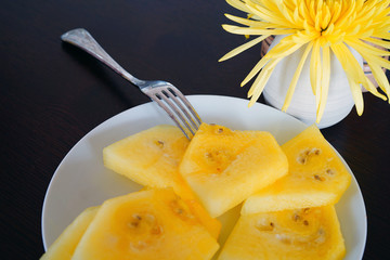 Platter of sliced yellow watermelon