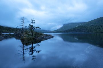 Fototapeta na wymiar Amazing evening landscape on Innerdalsvatna lake