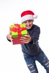 Fototapeta na wymiar Smiling man in Santa hat with gift boxes. Concept Christmas, holiday, new year.