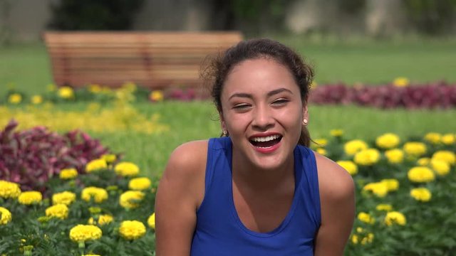 young hispanic woman laughing