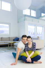 couple sitting on the floor at home