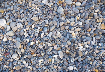Nature background from gray sea pebbles