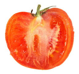Red tomato cut in half inside longitudinal section isolated on white background