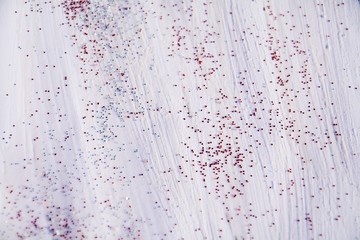 Red points and lights on white background, paint watercolor texture