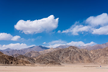 Landscape image of mountains and blue sky background in Ladakh , India