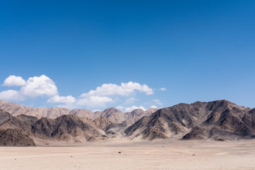 Fototapeta na wymiar Landscape image of mountains and blue sky background in Ladakh , India