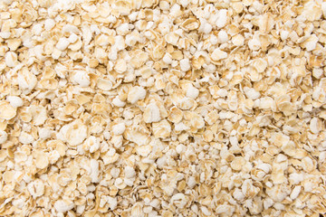 Oat cereal flake. Closeup of grains, background use.