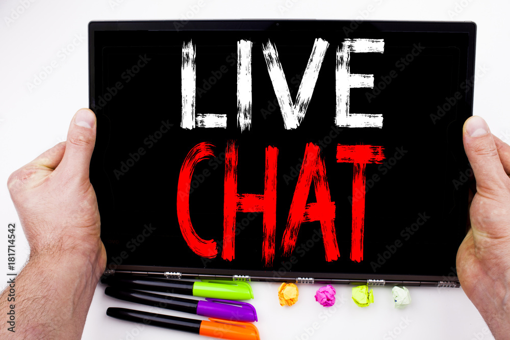 Fototapete live chat text written on tablet, computer in the office with marker, pen, stationery. business conc