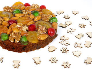 Fototapeta premium traditional fruitcake with fruits and nuts