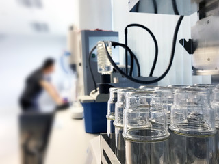 Young scientist experiment chemical research in science classroom and laboratory. -Science concept blur image use for background.