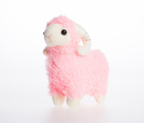 toy or goat or sheep on a background.
