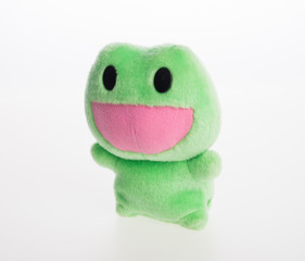 toy or frog soft toy on the background.