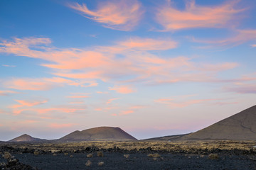 Obraz premium Stunning view of the volcanic landscape at sunset. Lanzarote. Canary Islands. Spain