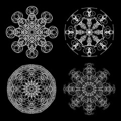Set of flower mandalas in black and white. Hand drawn sacred geometry mandala background. Seed of life symbols. Vector.