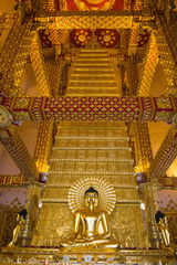 Golden buddha statue in buddhism Ubon Ratchathani, thailand