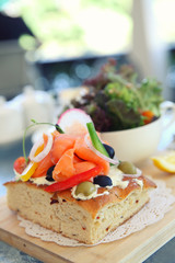 Smoked salmon on toast with salad vegetable