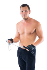 young athlete with a rope in his hands, isolated on a white background