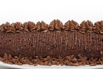 Chocolate homemade cake Close Up isolated on white background