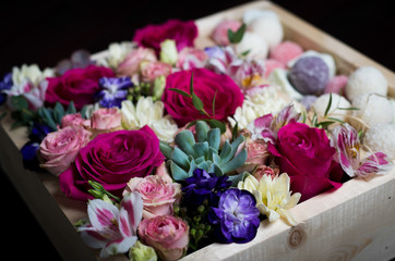 Beautiful and delicate flowers in gift boxes	