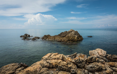 Beautiful view point rock just off shore and blue sky , Chanthaburi, Thailand.