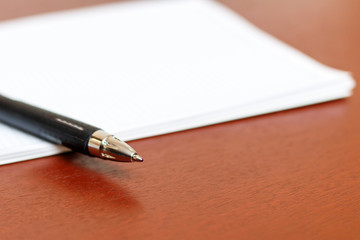 The notebook in the box with pen closeup