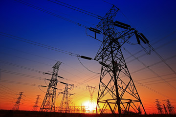 Fototapeta premium Sunset silhouette of pylon