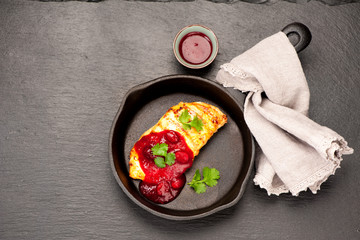 Grilled chicken breast with curcuma spicy and cranberry sauce.