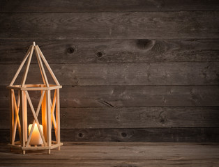 wooden lantern on old rustic background