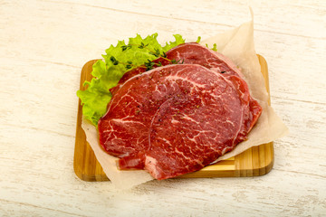 Raw beef schnitzel