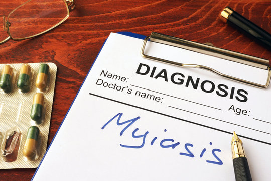 Medical form with diagnosis Myiasis on a clipboard.