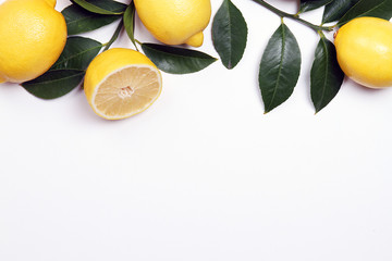  Delicious citrus and green leaves on a white background