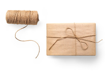 parcel wrapped packaged box gift and rope isolated on white background