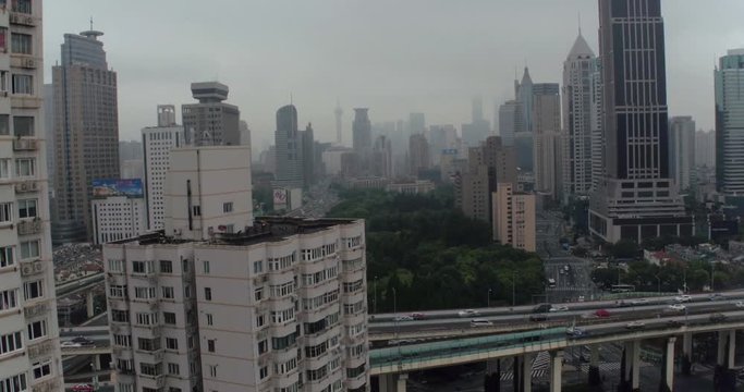 SHANGHAI, CHINA – JUNE 2016 : Aerial view over central Shanghai with view of the TV Tower and the skyline